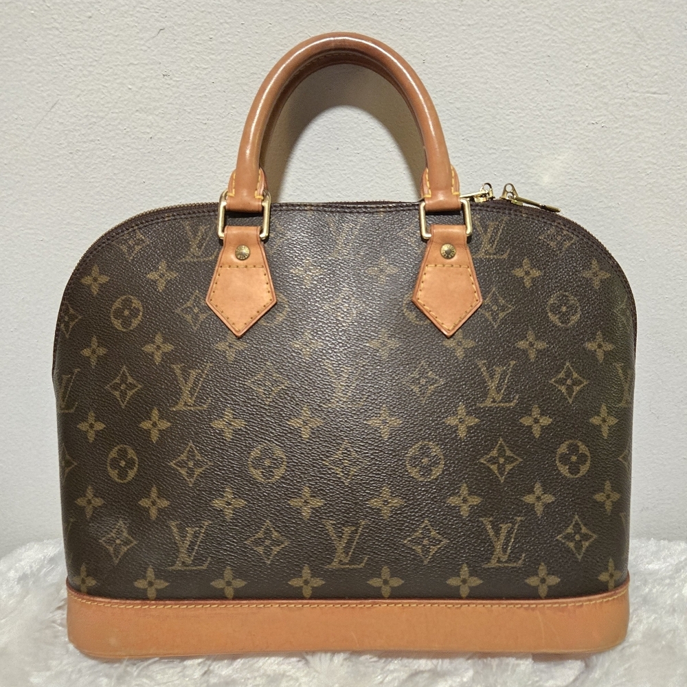 Louis Vuitton Alma PM Monogram Handbag